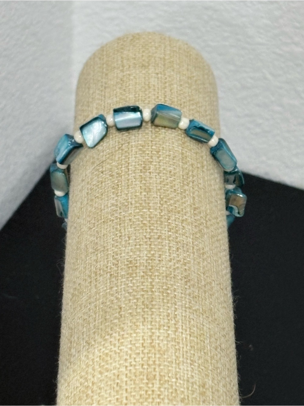 Handcrafted blue shell bead with smaller white spacer bead beaded bracelet